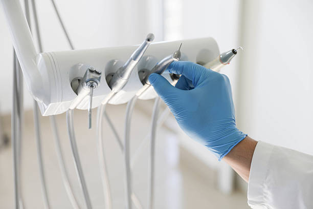 Professional Tooth Extraction technician working in Vernon, AL